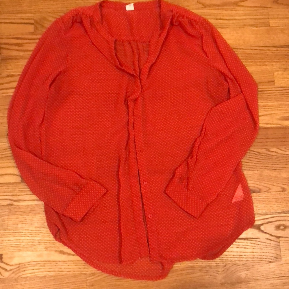 Reddish orange long sleeve button up shirt